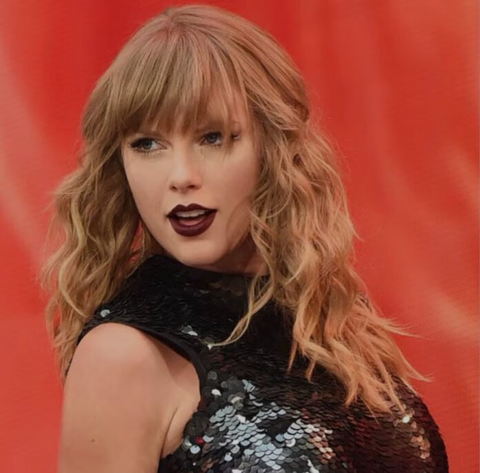 Taylor Swift countdown with orange backdrop teasing Aug. 12 announcement